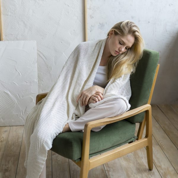 young-adult-sleeping-chair